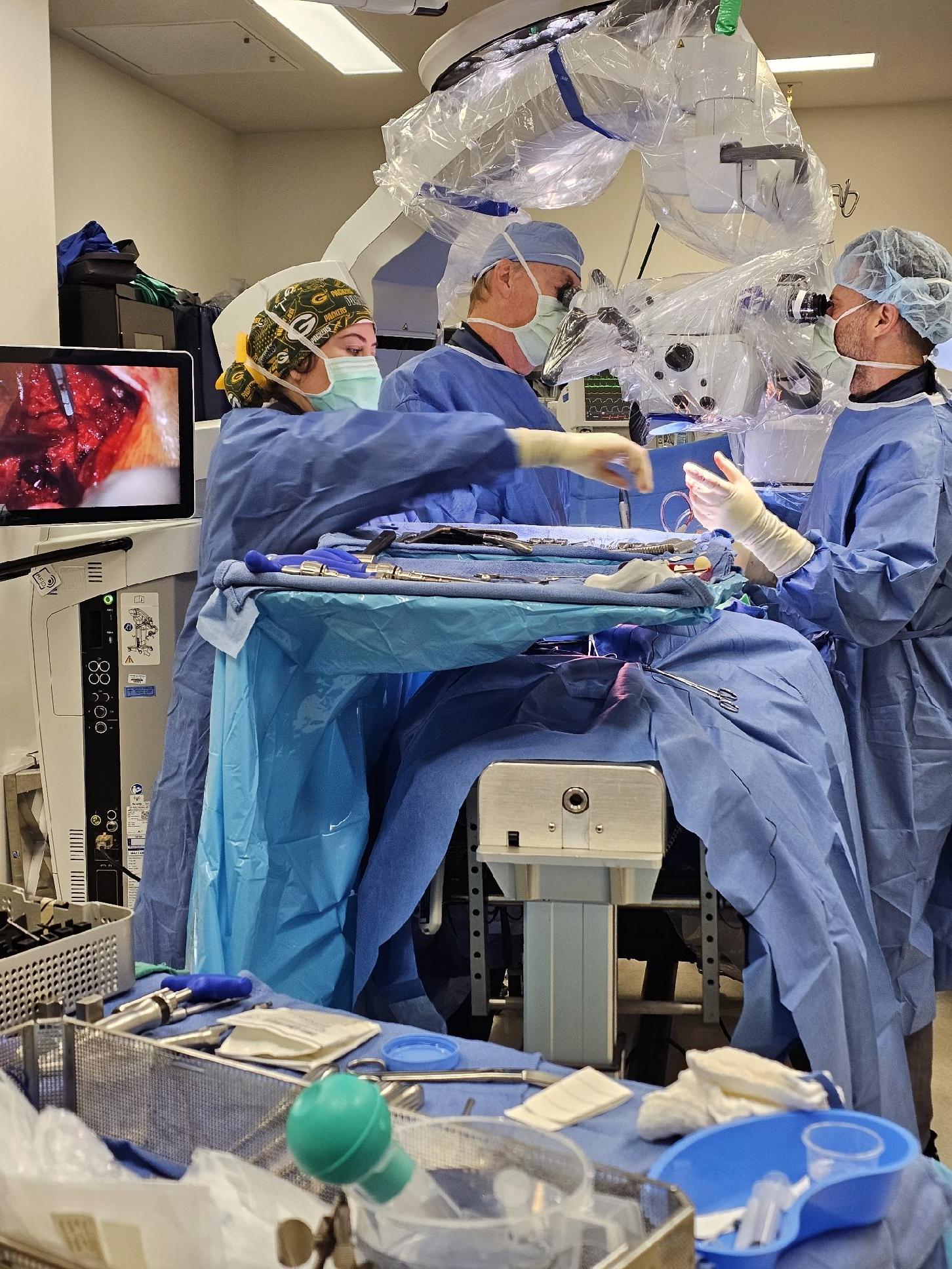Image Courtesy: Public Domain : Dr. Todd H. Lanman and his colleague Dr. Jared Ament performing a surgical procedure